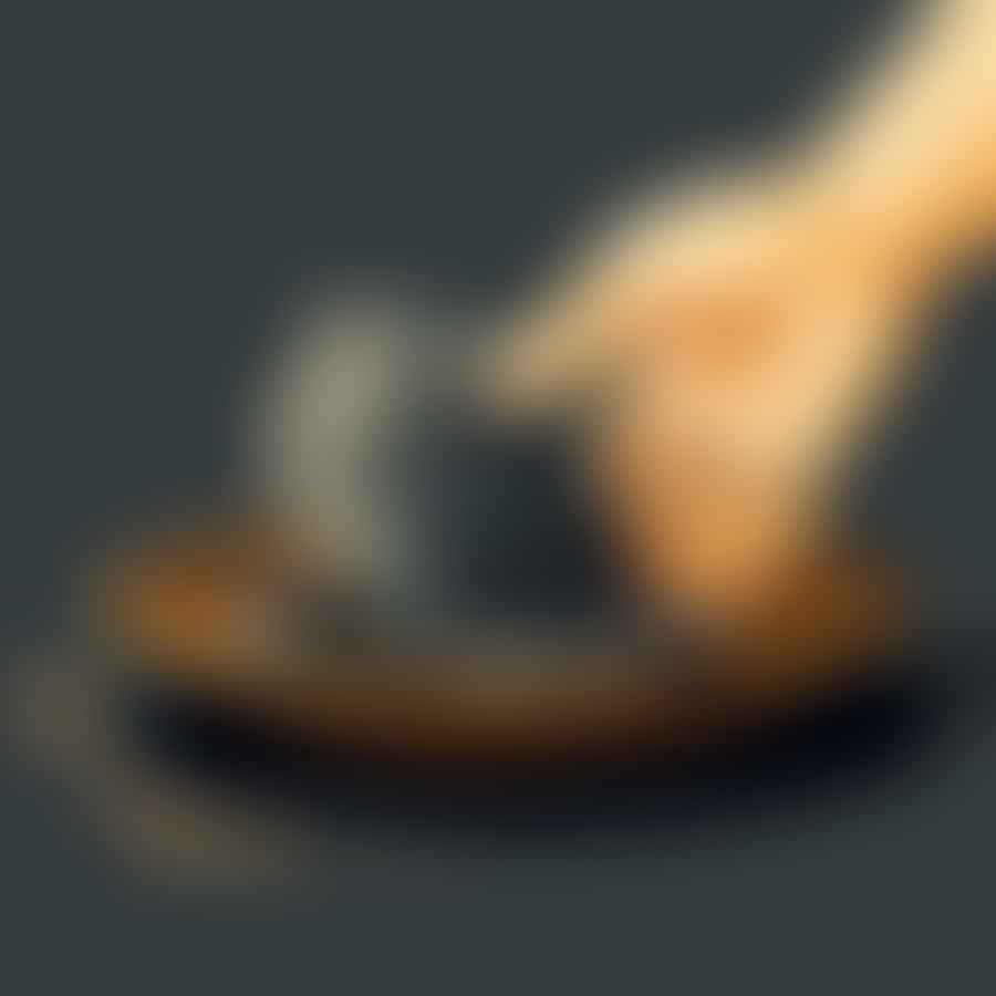 A shiny rock being polished with a cloth.